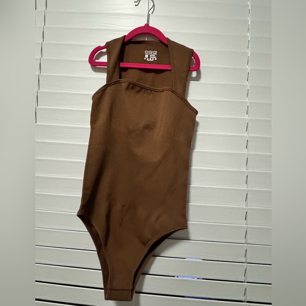 Brown body suit